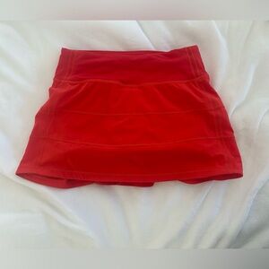 Lululemon skirt red (is like a red orange). Regular length!